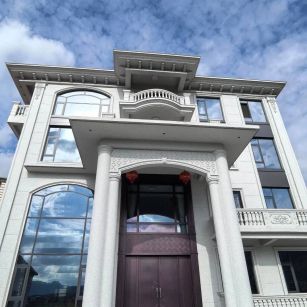 三明白麻别墅外墙干挂石材效果示例