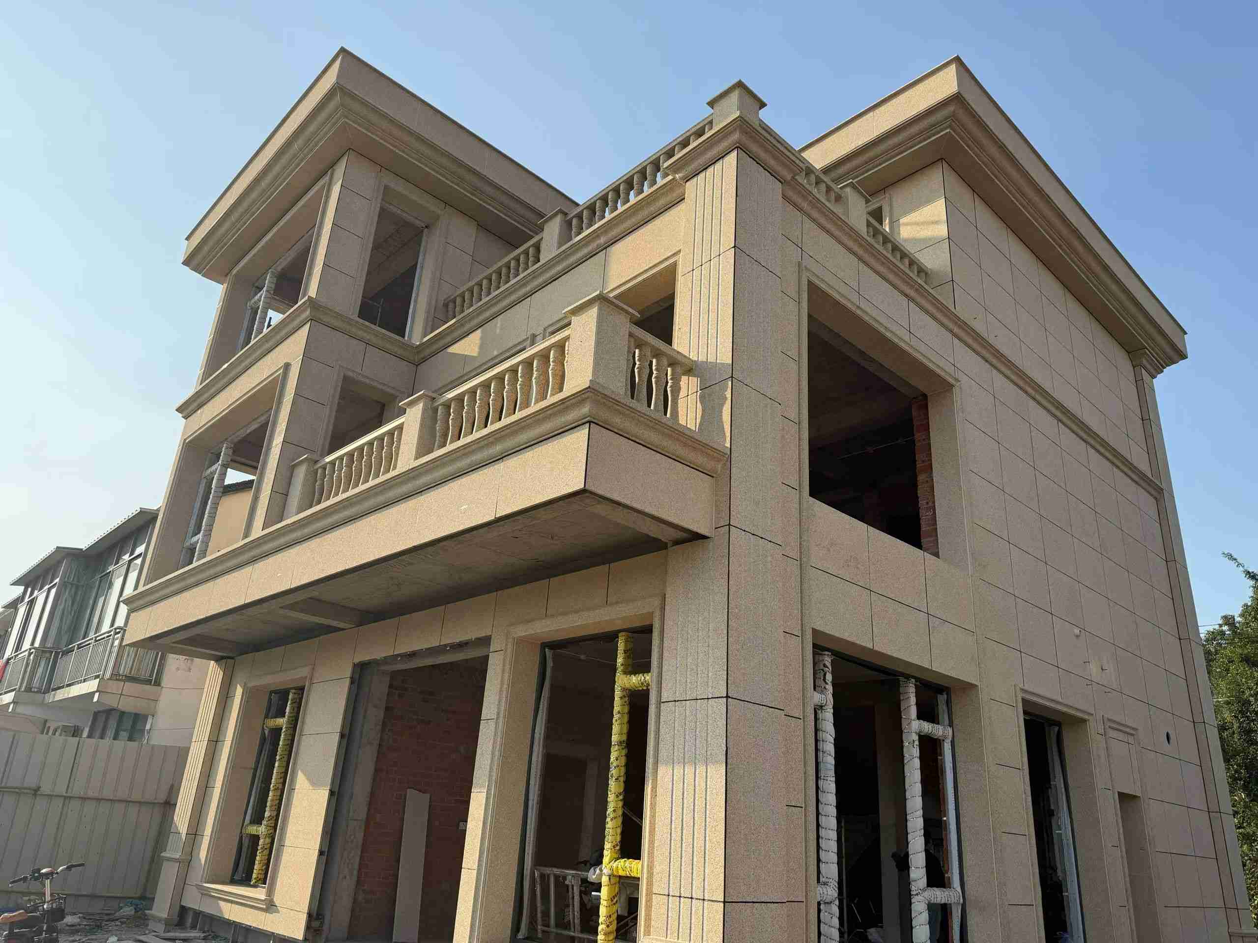 三明 黄金麻花岗岩石材荔枝面外墙干挂效果展示